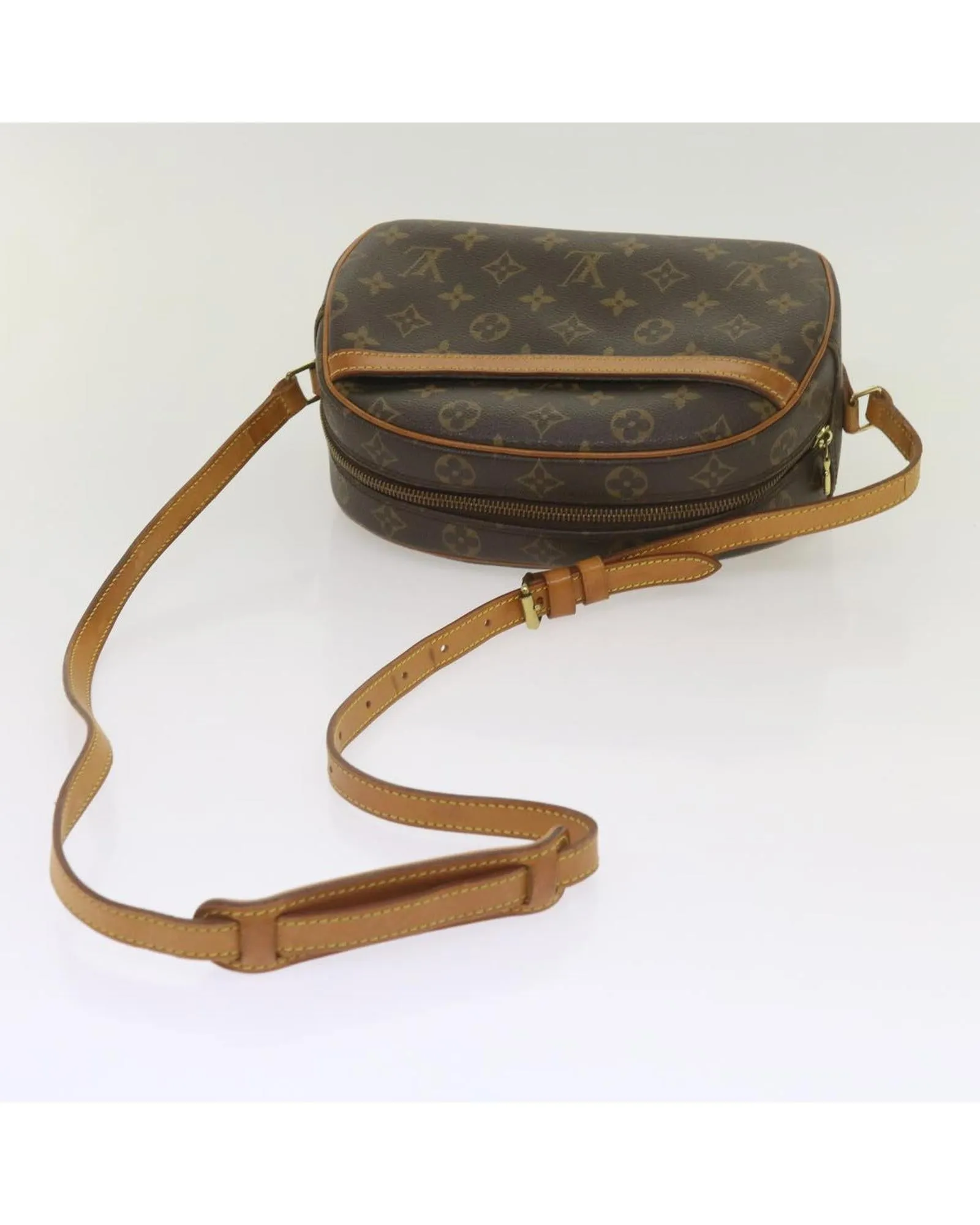 Monogram Shoulder Bag with Flap Closure and Multiple Compartments